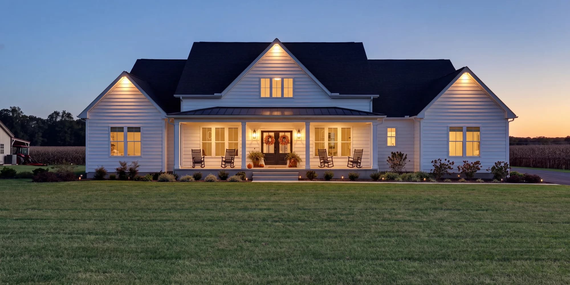 Virtual twilight: the same frame at dusk, with downlights glowing in the gables and lit windows